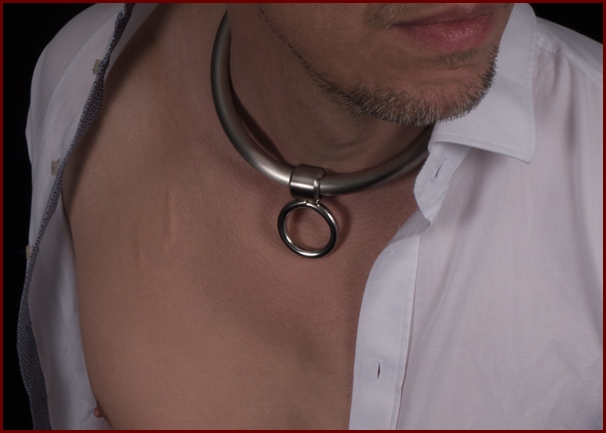 Male submissive collar in a clean minimalist steel design.